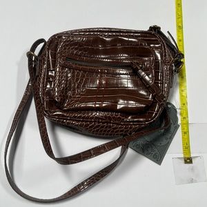 New purse with tags. Small size D7-73